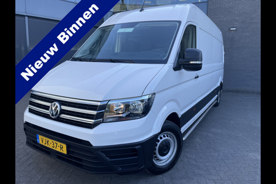 Volkswagen Crafter 35 2.0 TDI L4H3 Highline Airco - parkeersensoren achter - cruise control - zijschuifdeur rechts - tussenschot volledig - Ideaal voor camper
