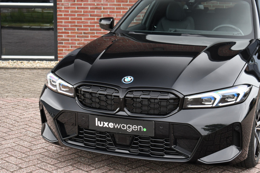 BMW 3 Serie Touring 330e xDrive M-Sport Pano ACC H/K 360 HUD El-zetel 19inch