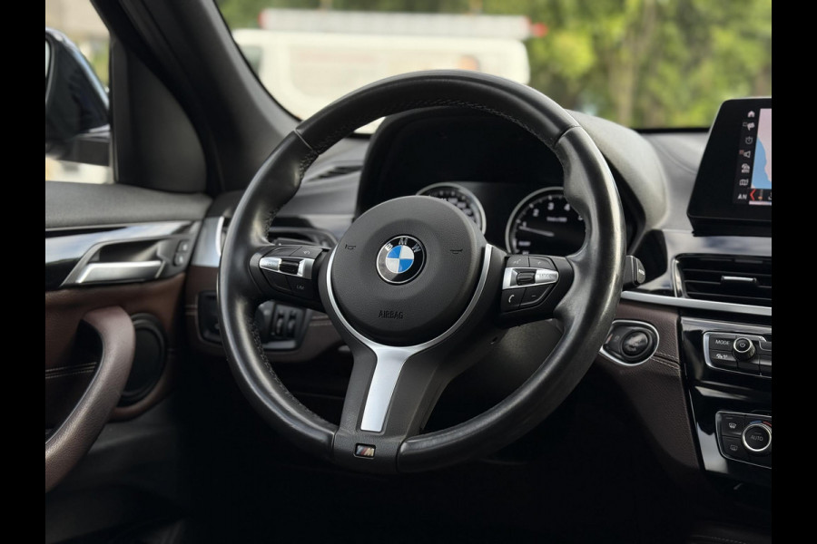 BMW X1 sDrive20i Aut. 190pk High Exe. | Navi | Leder | Stoelverw. |