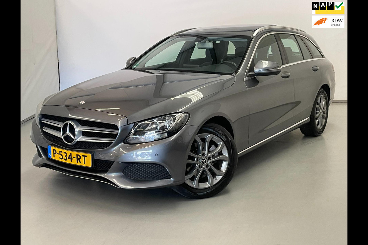 Mercedes-Benz C-Klasse Estate 180 / Pano / Stoelverwarming / Leder / Trekhaak Mercedes-Benz C-Klasse Estate 180 / Pano / Stoelverwarming / Leder / Trekhaak