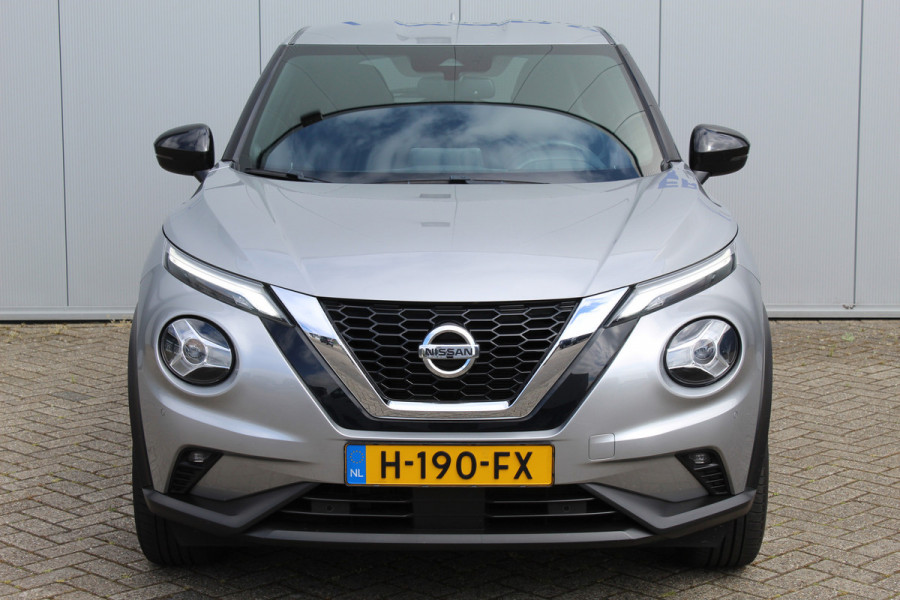 Nissan Juke 1.0-117pk DIG-T N-Connecta. Werkelijk in nieuwstaat ! Slechts 12.600km ! Volautm. airco, privacy glass, metallic lak, LM wielen, navigatie, camera, pdc v+a, telefoonvoorb.,  keyless entry&go, LED etc.