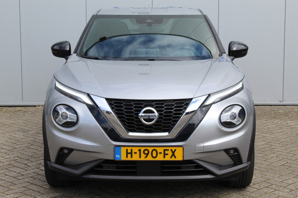 Nissan Juke 1.0-117pk DIG-T N-Connecta. Werkelijk in nieuwstaat ! Slechts 12.600km ! Volautm. airco, privacy glass, metallic lak, LM wielen, navigatie, camera, pdc v+a, telefoonvoorb.,  keyless entry&go, LED etc.