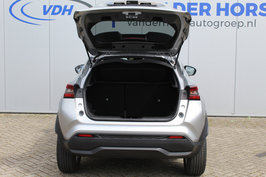 Nissan Juke 1.0-117pk DIG-T N-Connecta. Werkelijk in nieuwstaat ! Slechts 12.600km ! Volautm. airco, privacy glass, metallic lak, LM wielen, navigatie, camera, pdc v+a, telefoonvoorb.,  keyless entry&go, LED etc.