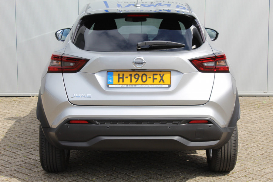 Nissan Juke 1.0-117pk DIG-T N-Connecta. Werkelijk in nieuwstaat ! Slechts 12.600km ! Volautm. airco, privacy glass, metallic lak, LM wielen, navigatie, camera, pdc v+a, telefoonvoorb.,  keyless entry&go, LED etc.