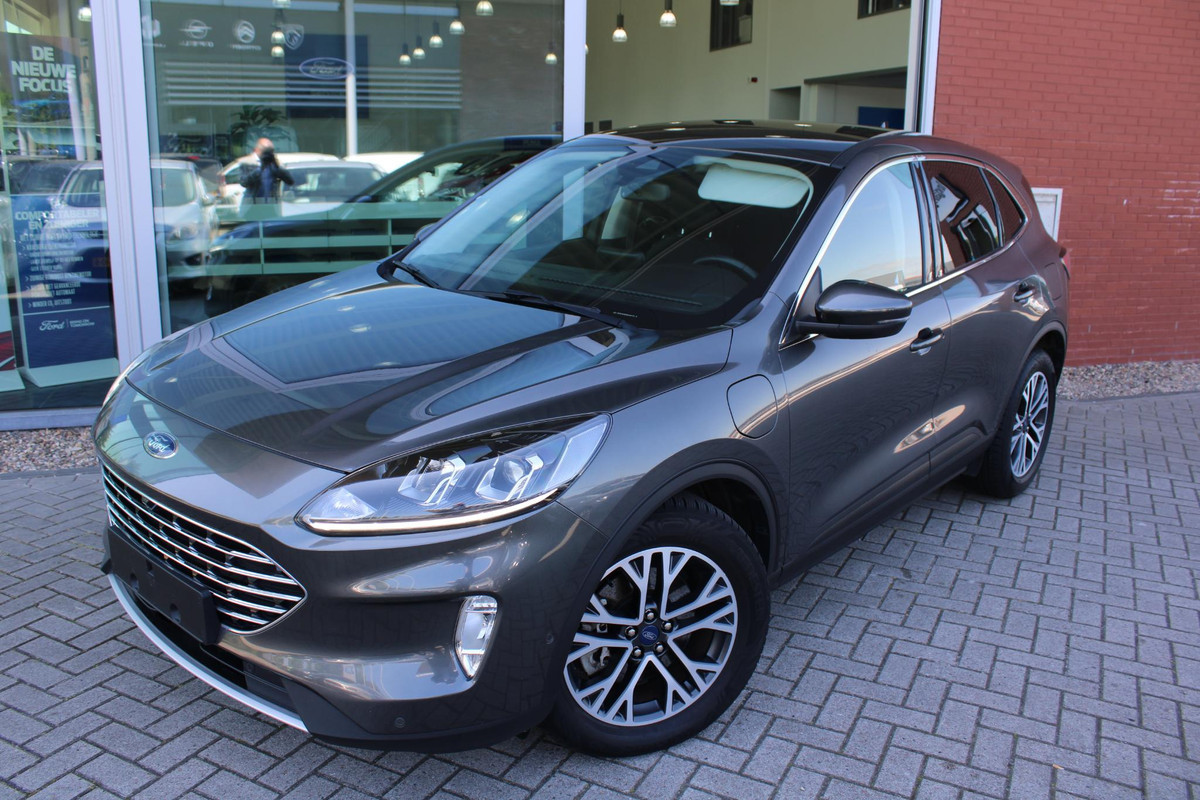 Ford Kuga 2.5 PHEV Titanium | Adaptive cruise control | Winter Pack | Dodehoeksensoren Ford Kuga 2.5 PHEV Titanium | Adaptive cruise control | Winter Pack | Dodehoeksensoren