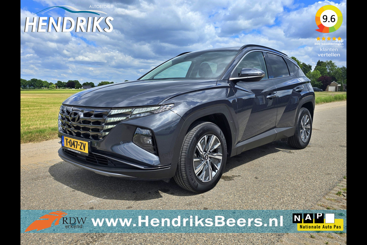 Hyundai Tucson 1.6 T-GDI HEV Comfort Smart - 180 Pk - Euro 6 - ParkeerCamera - StoelVerwarming Hyundai Tucson 1.6 T-GDI HEV Comfort Smart - 180 Pk - Euro 6 - ParkeerCamera - StoelVerwarming