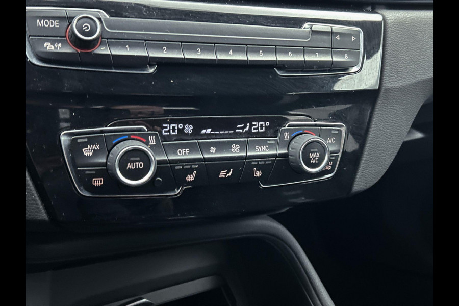 BMW X1 SDrive18i High Executive (Goed OnderH, Trekhaak, Navi, StoelV, Climate control, Etc)