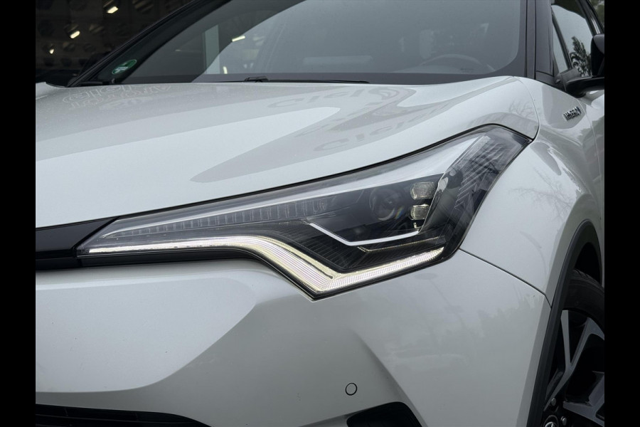 Toyota C-HR 1.8 Hybrid Bi-Tone Plus | Trekhaak, Dodehoekherkenning, Stoel + Stuurverwarming, Parkeersensoren, Navigatie, Keyless, 18inch