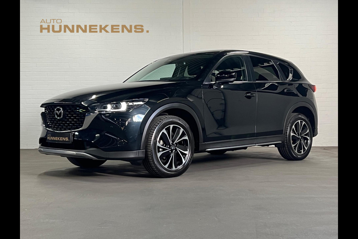 Mazda CX-5 2.5 Newground Leder/Alcantara | 360 Camera | Head-up | Stoel/Stuur verwarming | Cruise & Climate c. Mazda CX-5 2.5 Newground Leder/Alcantara | 360 Camera | Head-up | Stoel/Stuur verwarming | Cruise & Climate c.
