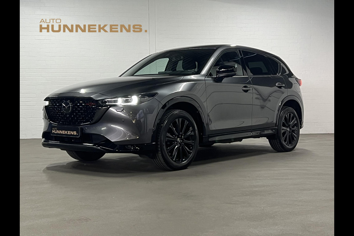 Mazda CX-5 2.0 e-Skyactiv-G Homura HUD | Keyless | 360 Camera | Leder/Alcantara | Adaptive cruise control | Stoel-/Stuurverwarming Mazda CX-5 2.0 e-Skyactiv-G Homura HUD | Keyless | 360 Camera | Leder/Alcantara | Adaptive cruise control | Stoel-/Stuurverwarming