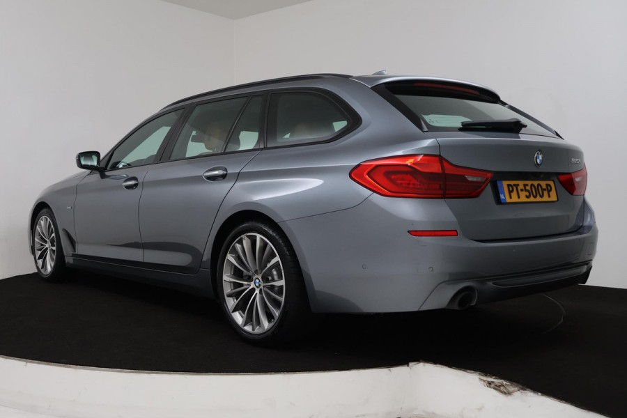 BMW 5 Serie Touring 520i High Executive (PANORAMADAK, PARKEERSENSOREN, CRUISE CONTROL, CAMERA, STOELVERWARMING, LEER)