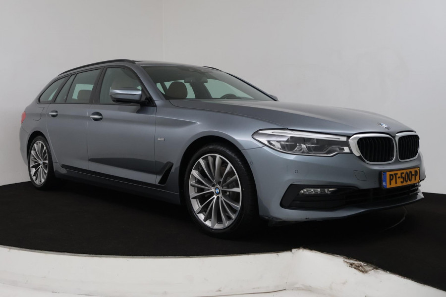 BMW 5 Serie Touring 520i High Executive (PANORAMADAK, PARKEERSENSOREN, CRUISE CONTROL, CAMERA, STOELVERWARMING, LEER)