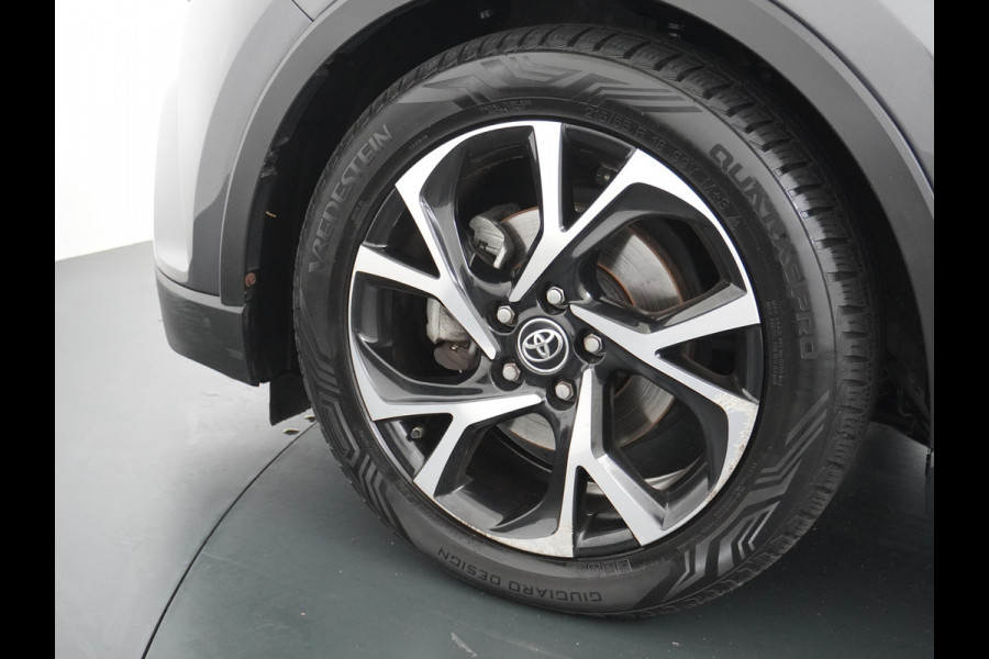 Toyota C-HR 1.8I Hybrid Automaat Voorruit+Stoel+Stuurverwarming Navi Camera Adap. Cruise Control Lane Assist Dynamic Regen/Lichtsensor Keyless Led Lmv 18" Bluetooth Rijstrooksensor Verkeersborddetectie