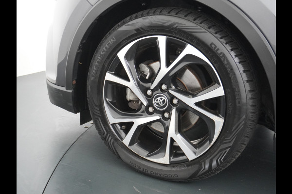 Toyota C-HR 1.8I Hybrid Automaat Voorruit+Stoel+Stuurverwarming Navi Camera Adap. Cruise Control Lane Assist Dynamic Regen/Lichtsensor Keyless Led Lmv 18" Bluetooth Rijstrooksensor Verkeersborddetectie