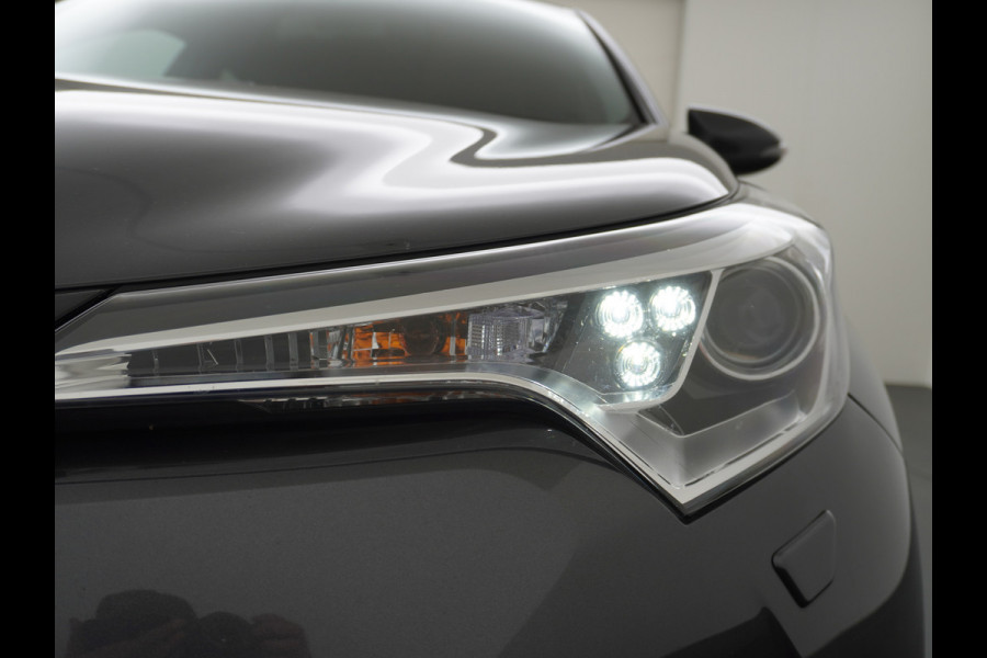 Toyota C-HR 1.8I Hybrid Automaat Voorruit+Stoel+Stuurverwarming Navi Camera Adap. Cruise Control Lane Assist Dynamic Regen/Lichtsensor Keyless Led Lmv 18" Bluetooth Rijstrooksensor Verkeersborddetectie