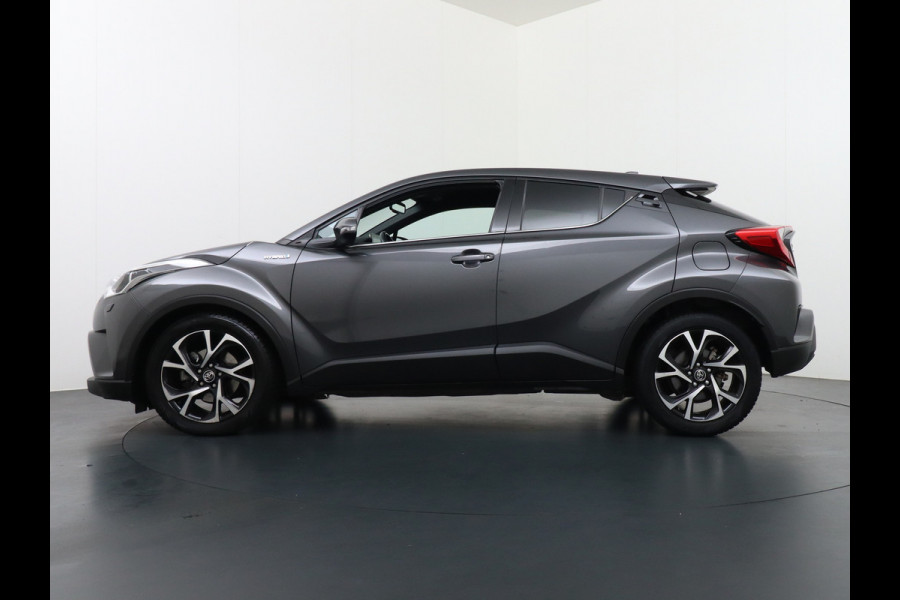 Toyota C-HR 1.8I Hybrid Automaat Voorruit+Stoel+Stuurverwarming Navi Camera Adap. Cruise Control Lane Assist Dynamic Regen/Lichtsensor Keyless Led Lmv 18" Bluetooth Rijstrooksensor Verkeersborddetectie