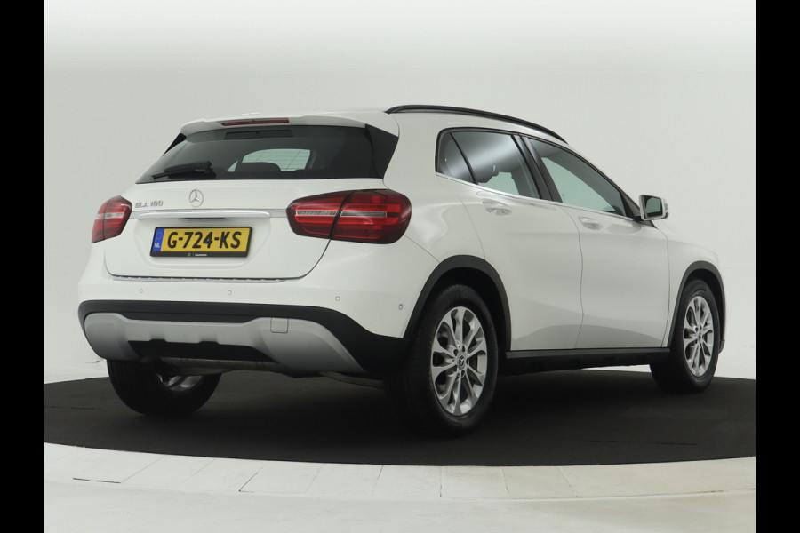 Mercedes-Benz GLA 180 Business Solution Limited | Dual Climate Control | Camera | Parkeersensoren | Navigatie | Stoelverwarming | Inclusief 24 maanden MB Certified garantie voor Europa.