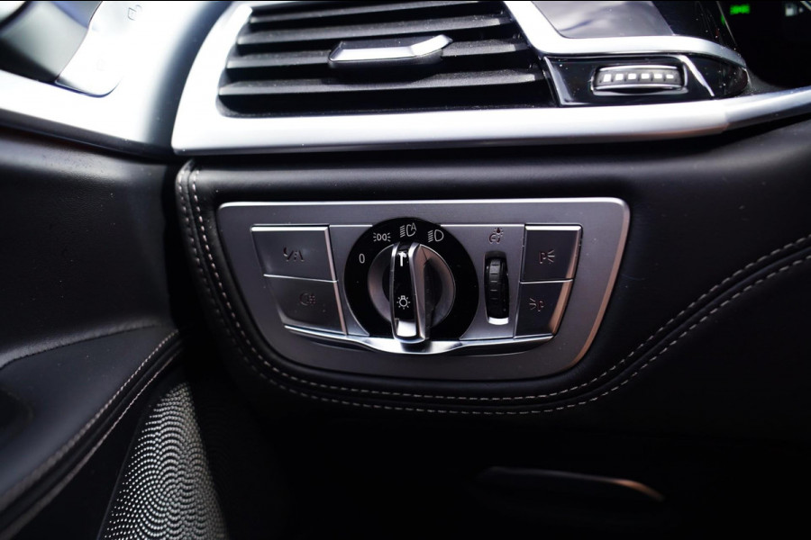 BMW 7 Serie M760Li xDrive High Executive | Massage | TV | Koelbox | HuD | BMW Drive Assisted | 360 cam | Stoelkoeling | Bowers |
