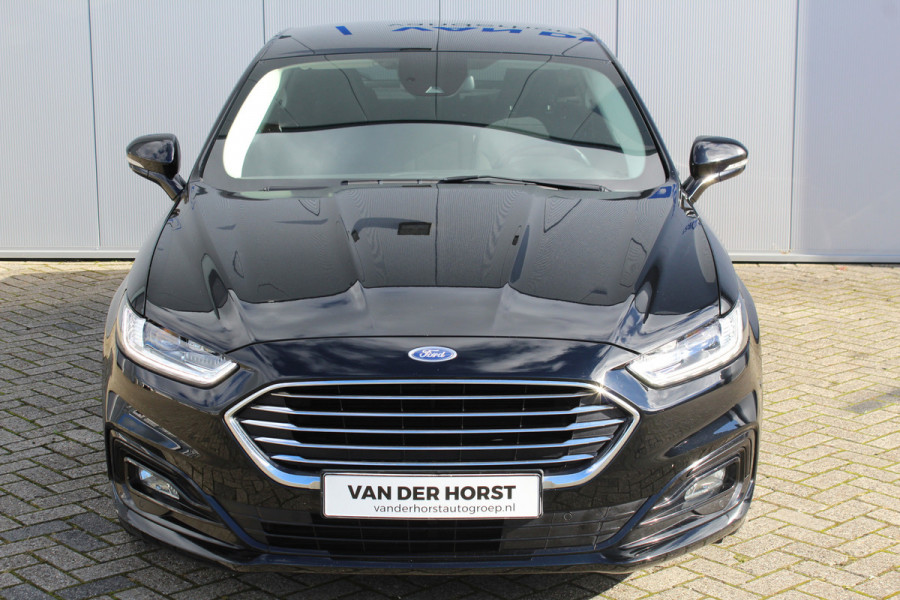 Ford Mondeo 1.5-165pk Business Edition. Het is genieten met deze fijne comfortabele Ford Mondeo ! Volautm. airco, navigatie, cruise cntrl, LM wielen, USB, keyless entry/keyless go, stoel- en voorraamverwarmw., parkeersensoren v+a, automatisch grootlicht, LED verl., etc.