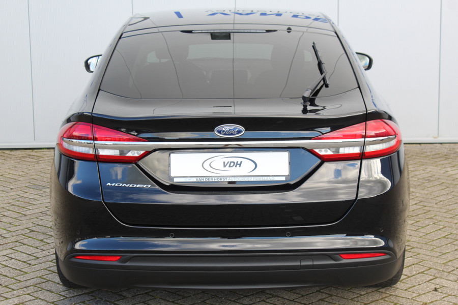 Ford Mondeo 1.5-165pk Business Edition. Het is genieten met deze fijne comfortabele Ford Mondeo ! Volautm. airco, navigatie, cruise cntrl, LM wielen, USB, keyless entry/keyless go, stoel- en voorraamverwarmw., parkeersensoren v+a, automatisch grootlicht, LED verl., etc.