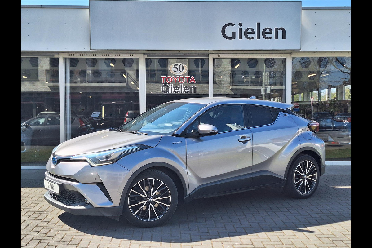 Toyota C-HR 1.8 Hybrid Executive | LED Pakket, Dodehoekherkenning, Navigatie, Stoel + Stuurverwarming, Keyless, Leer/Stof, 18 inch Toyota C-HR 1.8 Hybrid Executive | LED Pakket, Dodehoekherkenning, Navigatie, Stoel + Stuurverwarming, Keyless, Leer/Stof, 18 inch