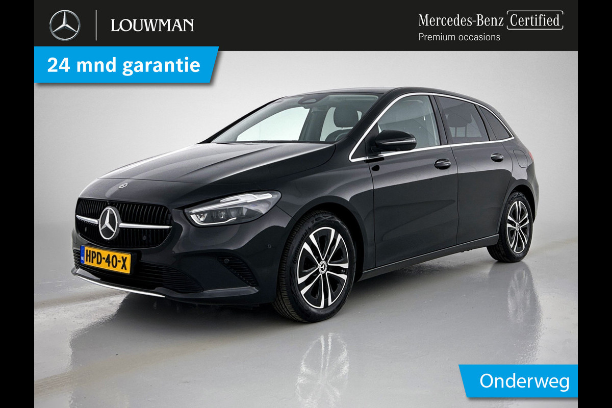 Mercedes-Benz B-Klasse 250 e Business Line Lichtmetalen velgen MBUX wide screen | Navigatie | Parking support | met camera achter | Inclusief 24 maanden Mercedes-Benz Certified garantie voor Europa. Mercedes-Benz B-Klasse 250 e Business Line Lichtmetalen velgen MBUX wide screen | Navigatie | Parking support | met camera achter | Inclusief 24 maanden Mercedes-Benz Certified garantie voor Europa.