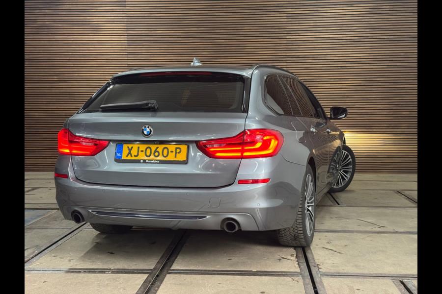 BMW 5 Serie Touring 520i High Executive Sportline | Leer | 360° Camera | Trekhaak