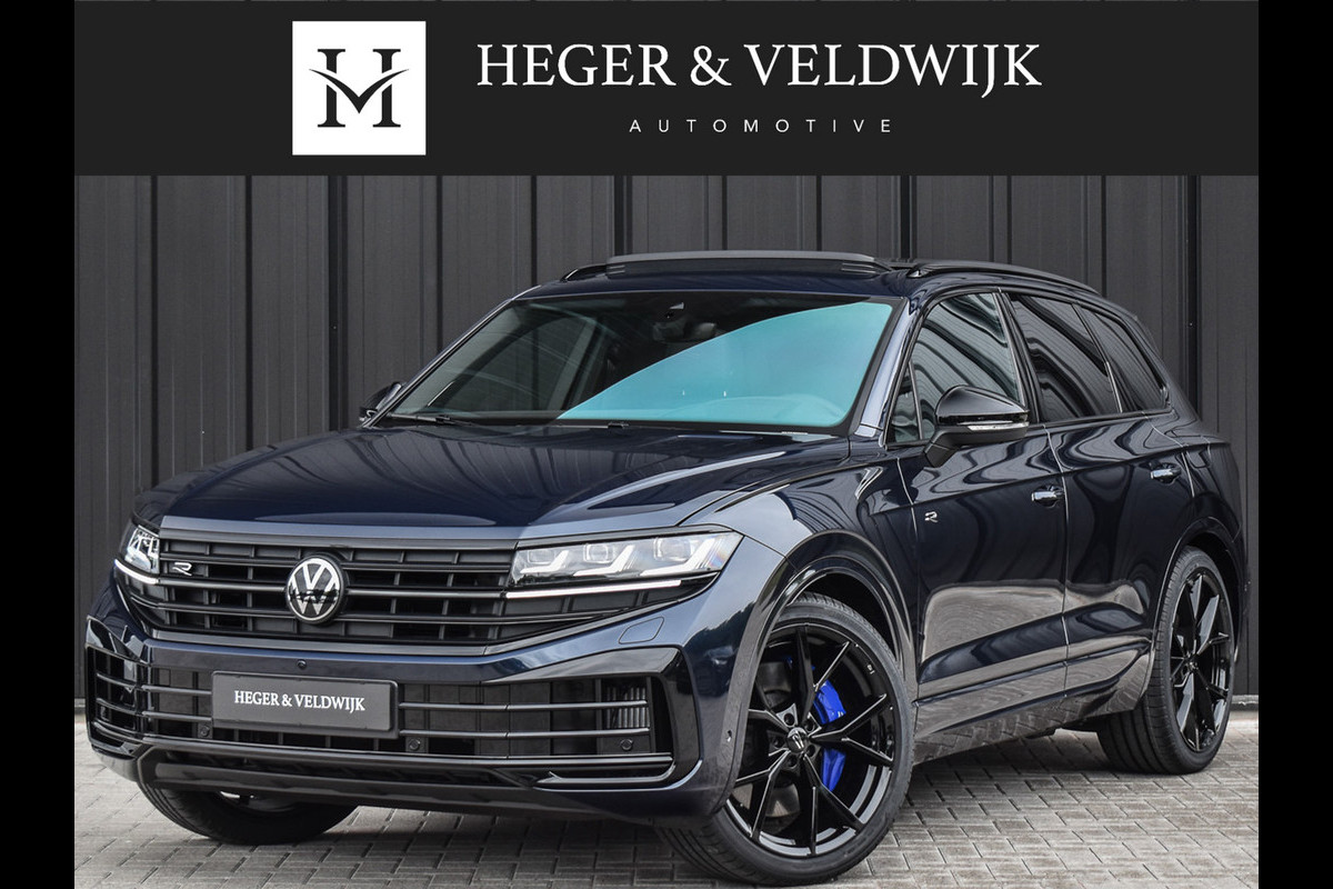 Volkswagen Touareg 3.0 TSi eHybrid 4MOTION R | HEAD-UP | DYNAUDIO | 360 CAMERA | SOFT-CLOSE | PANORAMADAK | KEYLESS ACCESS | STOELMASSAGE | TREKHAA Volkswagen Touareg 3.0 TSi eHybrid 4MOTION R | HEAD-UP | DYNAUDIO | 360 CAMERA | SOFT-CLOSE | PANORAMADAK | KEYLESS ACCESS | STOELMASSAGE | TREKHAA