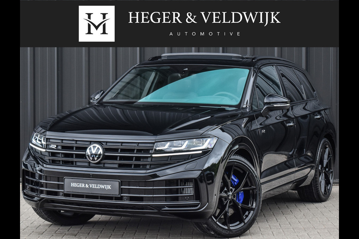 Volkswagen Touareg 3.0 TSi eHybrid 4MOTION R | HEAD-UP | DYNAUDIO | 360 CAMERA | SOFT-CLOSE | PANORAMADAK | KEYLESS ACCESS | STOELMASSAGE | TREKHAA Volkswagen Touareg 3.0 TSi eHybrid 4MOTION R | HEAD-UP | DYNAUDIO | 360 CAMERA | SOFT-CLOSE | PANORAMADAK | KEYLESS ACCESS | STOELMASSAGE | TREKHAA
