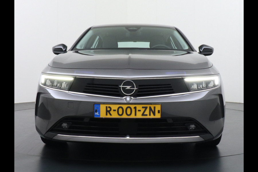 Opel Astra 1.2 T111PK Apple Carplay Navi-App Pure-Panel Virtual Cockpit PDC-v+a Keyless Ecc Led-a+v DAB+ Cruise Control Lmv Lane Assist Mistlamp Led Regensensor Hill Start Assist Rijstrooksensor met correctie Hill hold functie AEB ESPVermoeidheids herkenning Regensensor Verkeersbord detectie Mirror Screen Elektrisch verstelbare en verwarmbare buitenspiegels EURO6.4 Qi-lader Draadloos Orig.NLse auto slechts 35.600km! nieuwprijs € 33.500