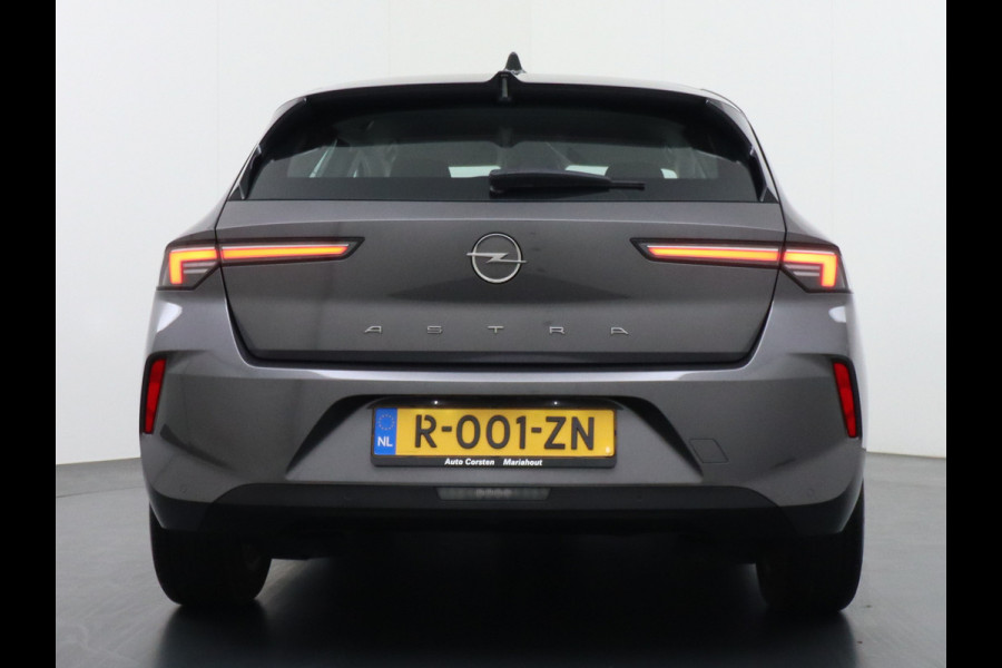 Opel Astra 1.2 T111PK Apple Carplay Navi-App Pure-Panel Virtual Cockpit PDC-v+a Keyless Ecc Led-a+v DAB+ Cruise Control Lmv Lane Assist Mistlamp Led Regensensor Hill Start Assist Rijstrooksensor met correctie Hill hold functie AEB ESPVermoeidheids herkenning Regensensor Verkeersbord detectie Mirror Screen Elektrisch verstelbare en verwarmbare buitenspiegels EURO6.4 Qi-lader Draadloos Orig.NLse auto slechts 35.600km! nieuwprijs € 33.500