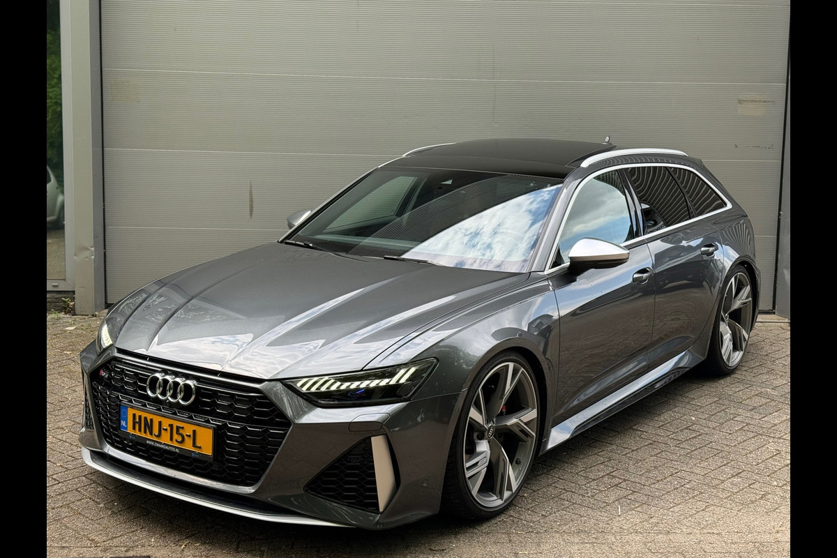 Audi A6 Avant RS6 TFSI quattro l Pano l Carbon l Klasse 5 Alarm+Volgsysteem l Luchtvering l Dynamo VV 05/2025 l B&O l Matrix l 22" Audi A6 Avant RS6 TFSI quattro l Pano l Carbon l Klasse 5 Alarm+Volgsysteem l Luchtvering l Dynamo VV 05/2025 l B&O l Matrix l 22"