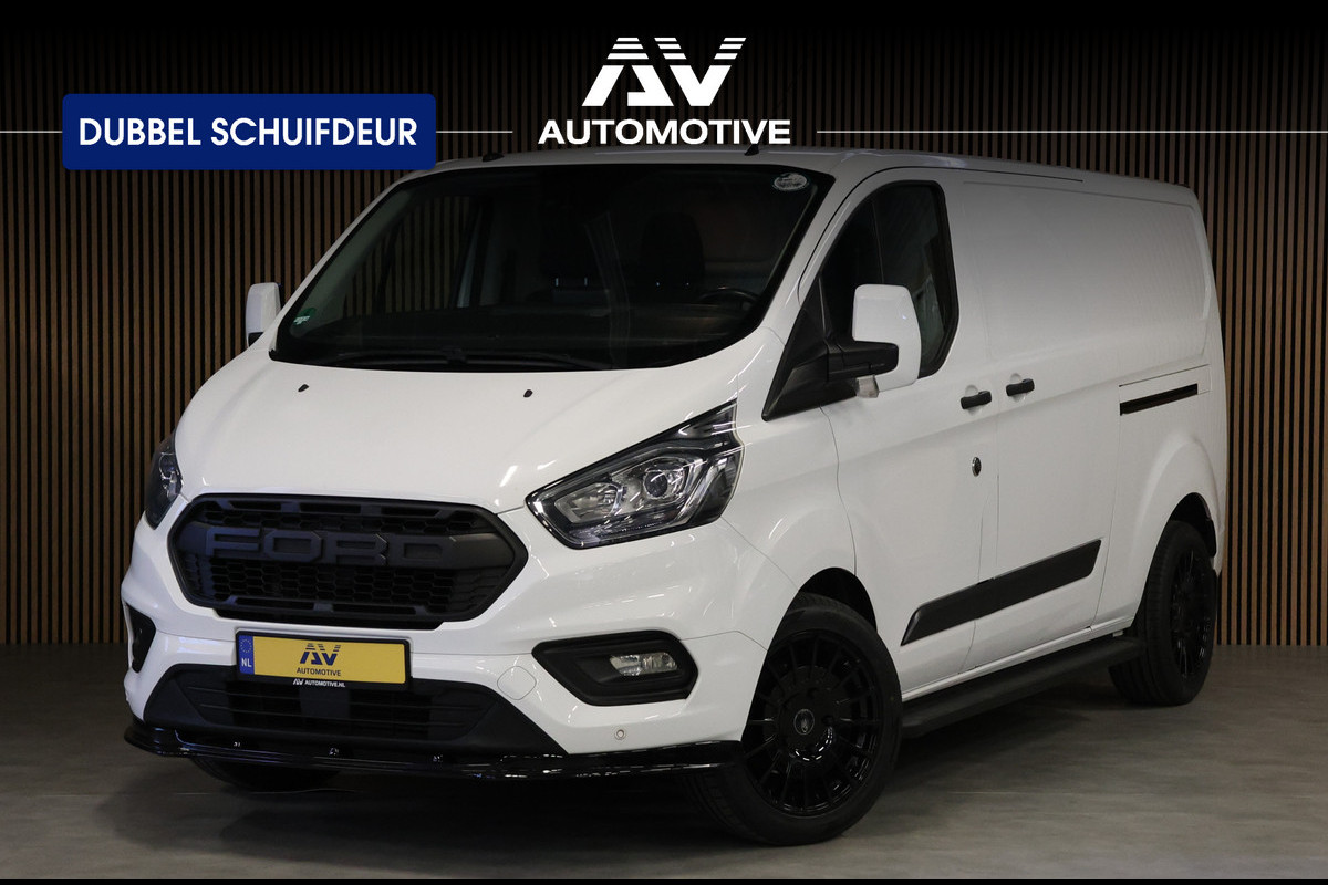 Ford Transit Custom 340 2.0 TDCI 190PK L2H1 | L+R Schuifdeur | Navigatie | Blind Spot | CarPlay | Camera | Standkachel | Trekhaak | 3-Zitter | Nieuwe APK | Onderhoudsbeurt Ford Transit Custom 340 2.0 TDCI 190PK L2H1 | L+R Schuifdeur | Navigatie | Blind Spot | CarPlay | Camera | Standkachel | Trekhaak | 3-Zitter | Nieuwe APK | Onderhoudsbeurt