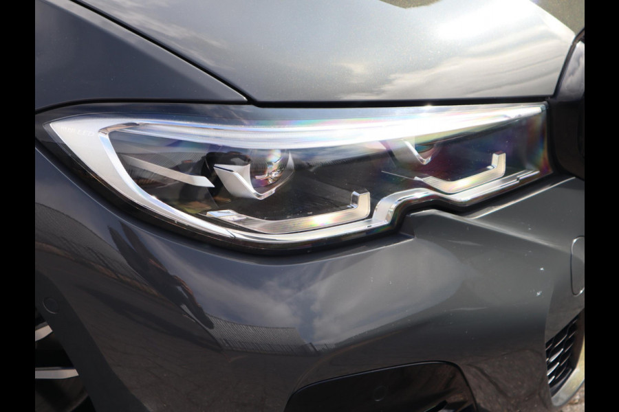 BMW 3 Serie Touring 320i High Executive | HUD | Panodak | Adaptive Cruise
