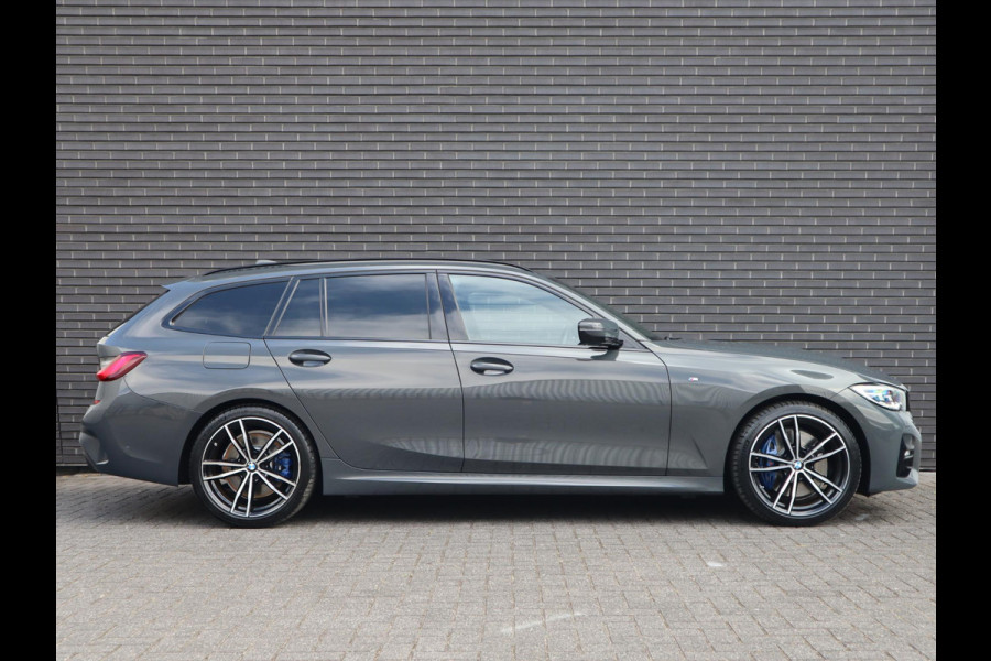BMW 3 Serie Touring 320i High Executive | HUD | Panodak | Adaptive Cruise