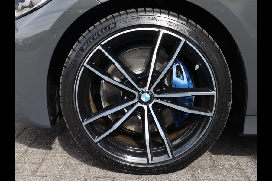 BMW 3 Serie Touring 320i High Executive | HUD | Panodak | Adaptive Cruise