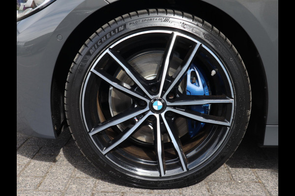 BMW 3 Serie Touring 320i High Executive | HUD | Panodak | Adaptive Cruise