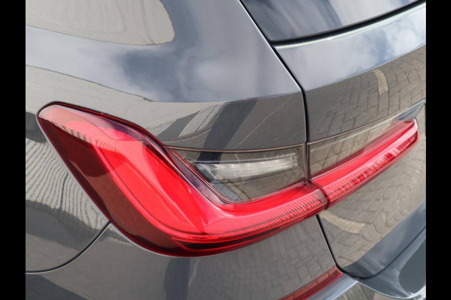 BMW 3 Serie Touring 320i High Executive | HUD | Panodak | Adaptive Cruise