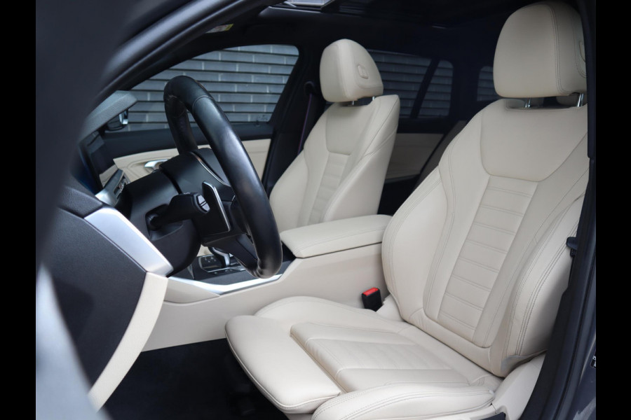 BMW 3 Serie Touring 320i High Executive | HUD | Panodak | Adaptive Cruise