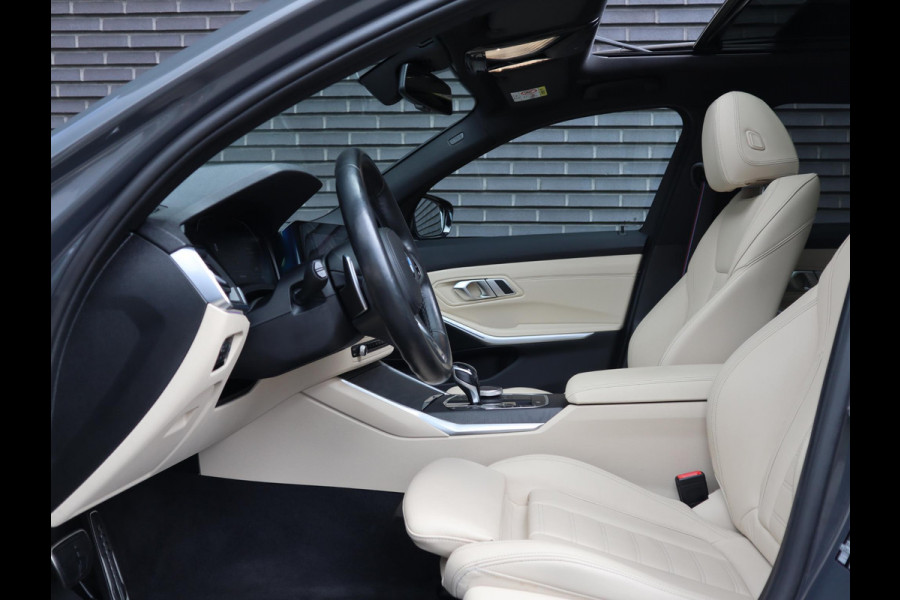 BMW 3 Serie Touring 320i High Executive | HUD | Panodak | Adaptive Cruise