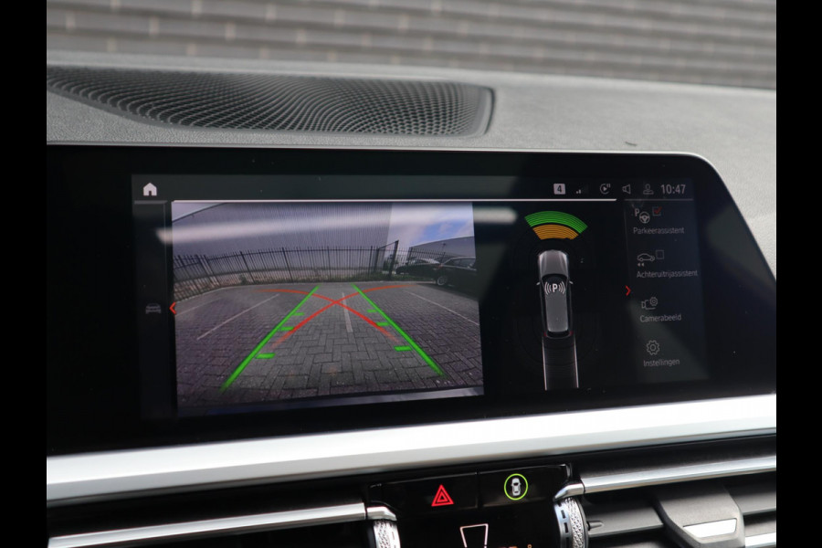 BMW 3 Serie Touring 320i High Executive | HUD | Panodak | Adaptive Cruise