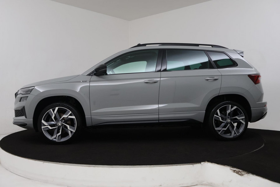 Škoda Karoq 1.5 TSI ACT Sportline Business (PANORAMADAK, STOEL-/STUURVERWARMING, ELEKT. TREKHAAK, ADAPTIVE CRUISE, CAMERA)