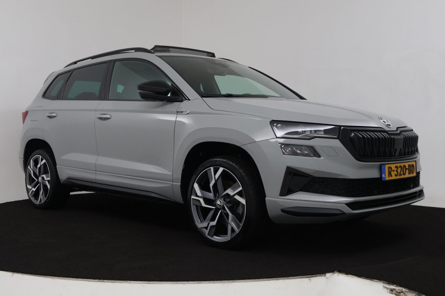 Škoda Karoq 1.5 TSI ACT Sportline Business (PANORAMADAK, STOEL-/STUURVERWARMING, ELEKT. TREKHAAK, ADAPTIVE CRUISE, CAMERA)