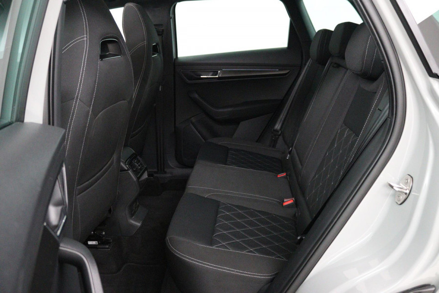 Škoda Karoq 1.5 TSI ACT Sportline Business (PANORAMADAK, STOEL-/STUURVERWARMING, ELEKT. TREKHAAK, ADAPTIVE CRUISE, CAMERA)