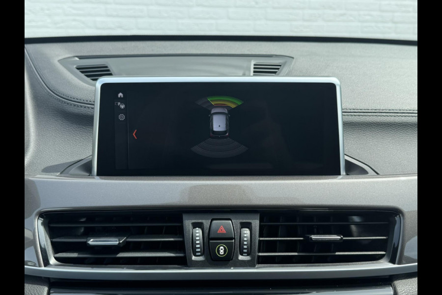 BMW X1 SDrive18i High Executive Trekhaak Navigatie Led verlichting Clima Cruise Panorama