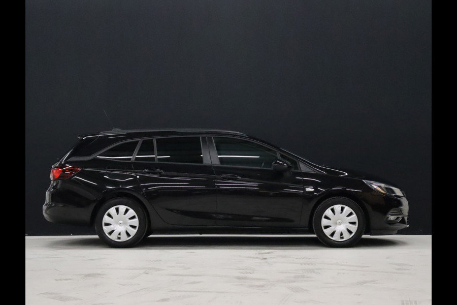 Opel Astra Sports Tourer 1.2 Business Edition [NAVIGATIE, TREKHAAK, PARKEERSENSOR, BLUETOOTH, AIRCO, NIEUWSTAAT]