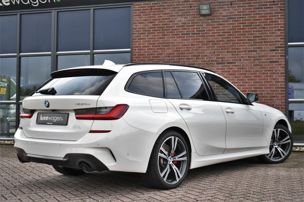 BMW 3 Serie Touring 330e M-Sport Pano Trekhaak Harman/K 19inch Camera