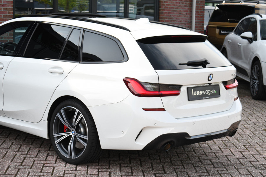 BMW 3 Serie Touring 330e M-Sport Pano Trekhaak Harman/K 19inch Camera