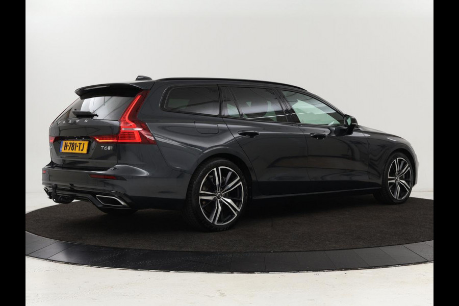 Volvo V60 2.0 T6 Twin Engine AWD R-Design | Stoelventilatie | Trekhaak | Leder | Massage | Achterbankverwarming | Camera | Adaptive cruise | Carplay | Full LED | 19'' lichtmetalen velgen