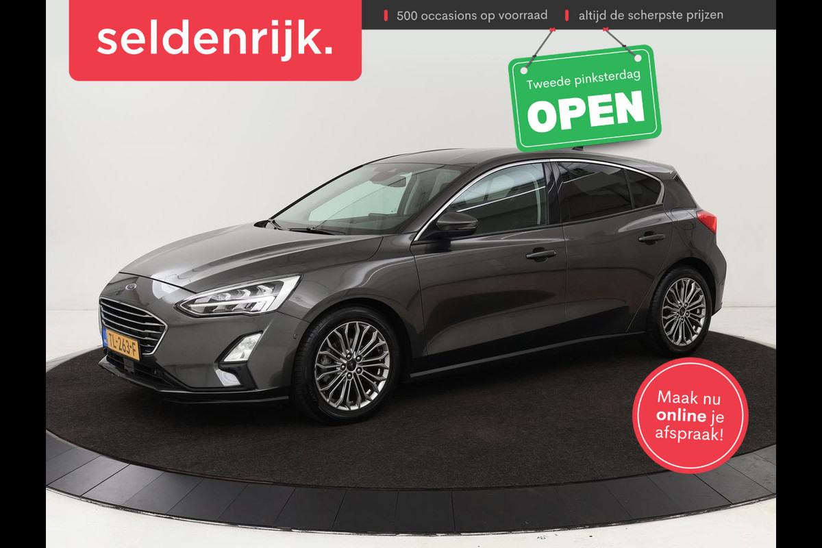 Ford Focus 1.0 EcoBoost Titanium | Stoel & stuurverwarming | Camera | Adaptive cruise | Carplay | B&O Sound | Navigatie | Full LED | Climate control Ford Focus 1.0 EcoBoost Titanium | Stoel & stuurverwarming | Camera | Adaptive cruise | Carplay | B&O Sound | Navigatie | Full LED | Climate control